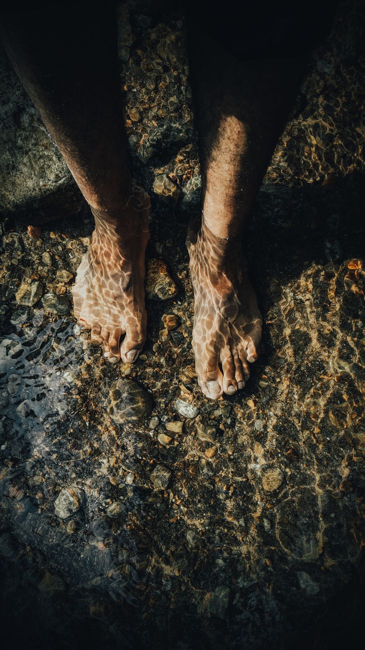 bare feet on the ground