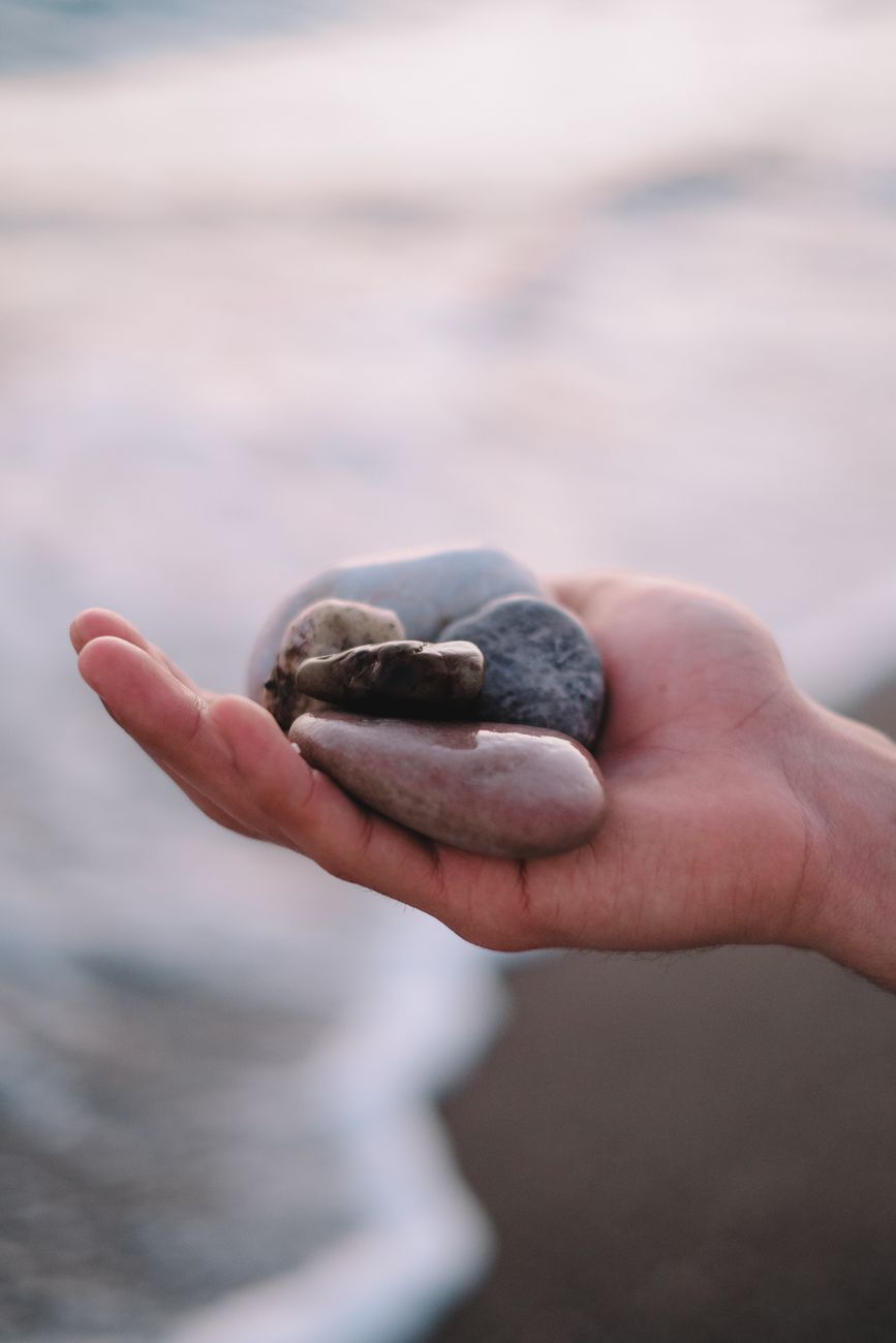 rocks on person s hand